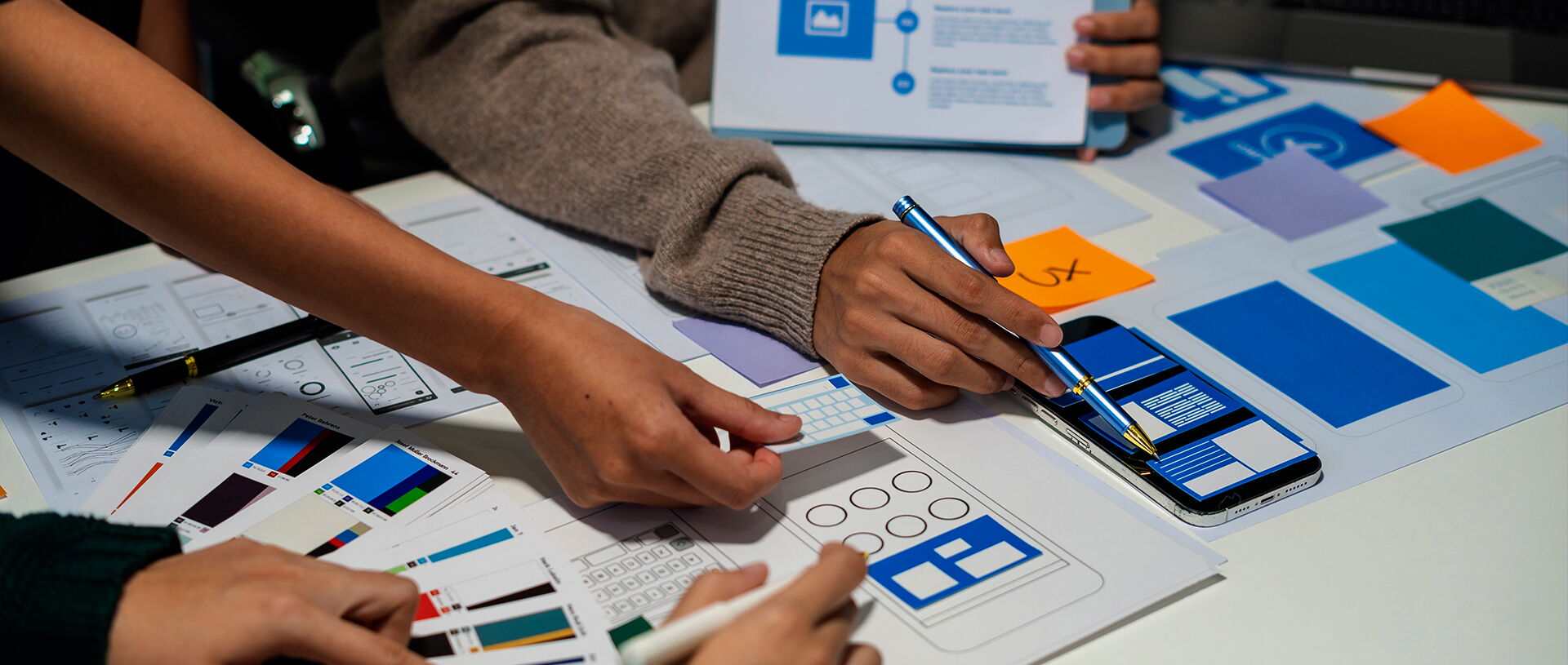 ph3 agency insight blog graphic individuals in a room planning brand breakdown layouts and colors