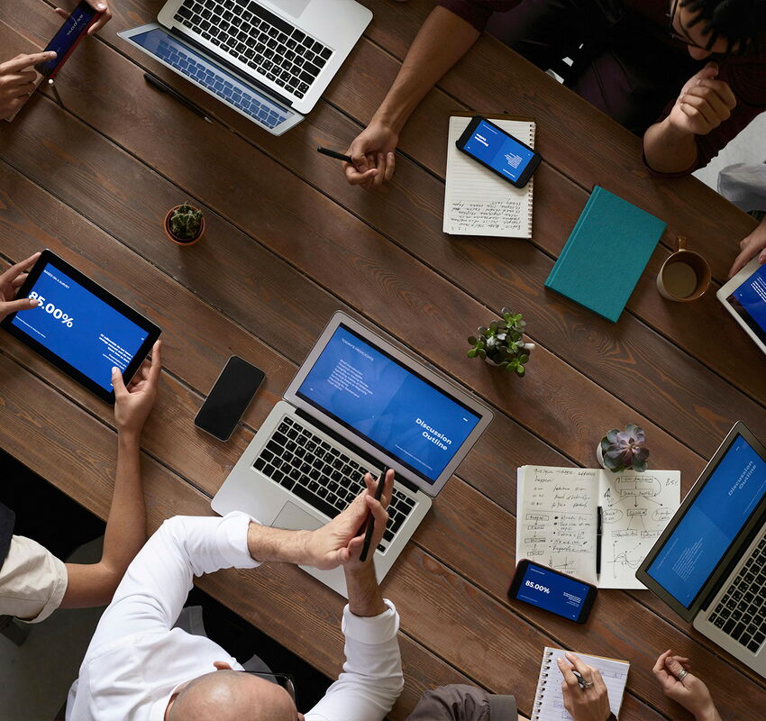 ph3 insights blog article of marketing consultants in a meeting going over data and analysis