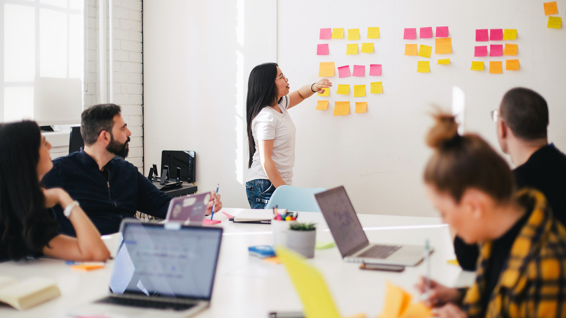 creatvie agency meeting and discussing brand development and strategy